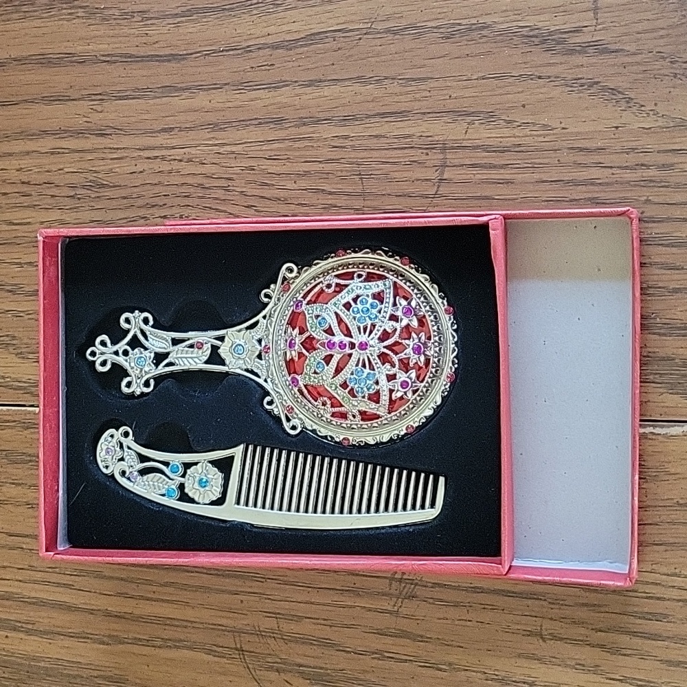 Retro portable mirror and comb set.